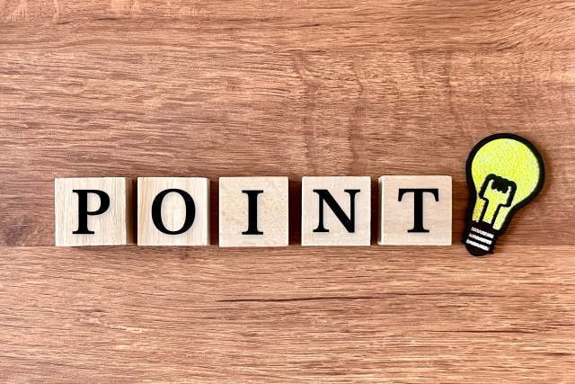 木のブロックにPOINTと書かれている